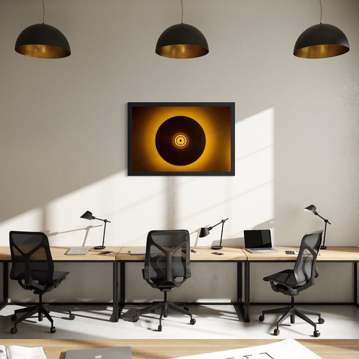 The artwork, Circles and Light, by Steve Edson, displayed in a room.