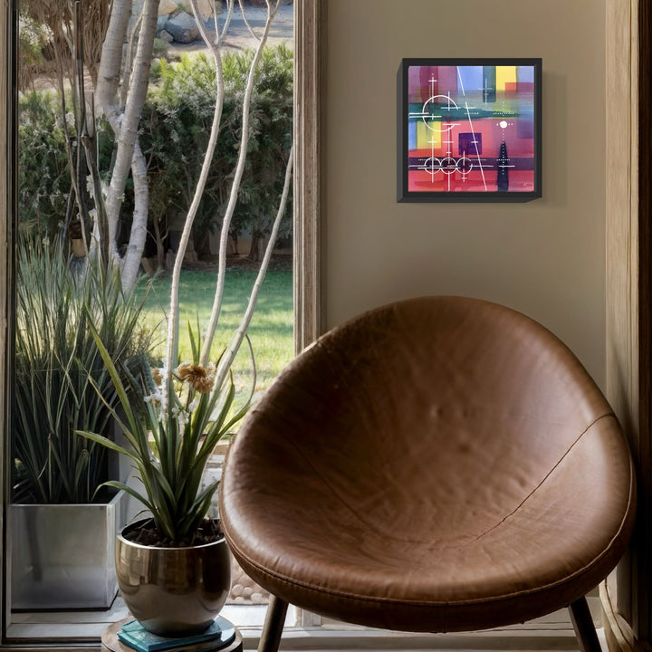 The artwork 'Cosmic Symphony' by Arthur Norcome features vibrant geometric shapes in pink, blue, and yellow arranged in an abstract grid pattern. Black linear elements intersect with colorful squares and rectangles, creating a modern composition reminiscent of urban landscapes. The 8x8 inch watercolor painting is displayed in a black frame, showcasing a dynamic interplay of colors and forms.