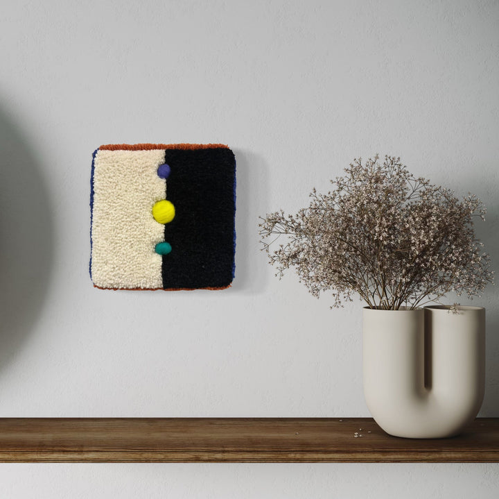 The artwork, Cosmic, by Ana Maria Farina, displayed in a room.