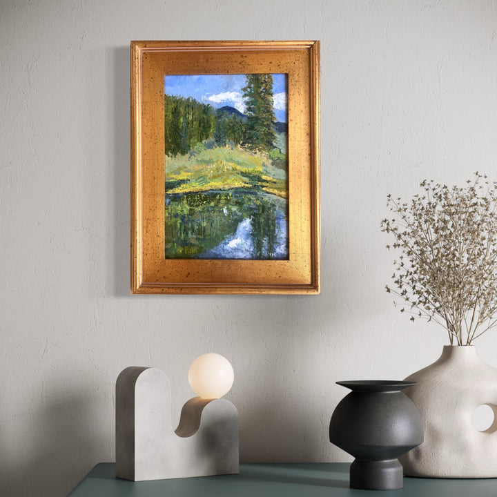 The artwork, Cowles Ponds, by Connie Falk, displayed in a room.