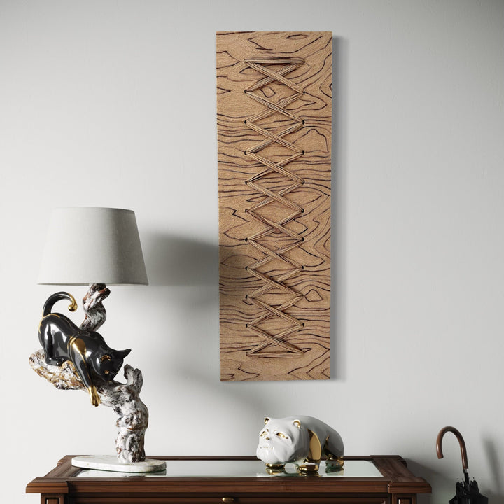 The artwork, Cross Stitch, by Quynn Douglas Dale, displayed in a room.