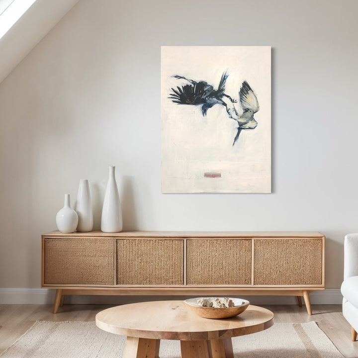 The artwork, Crow and Dove, by Chris Baily, displayed in a room.