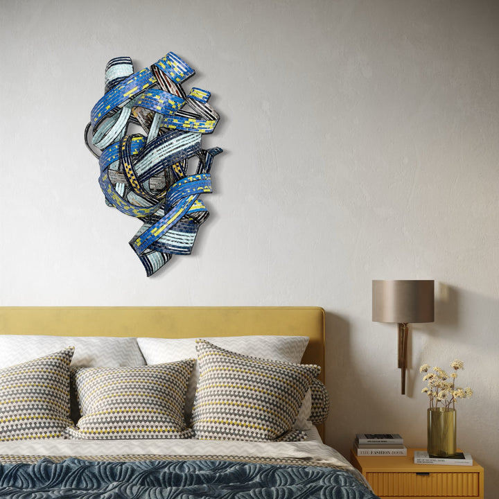 The artwork, Currents of Change, by Shelley Heffler, displayed in a room.