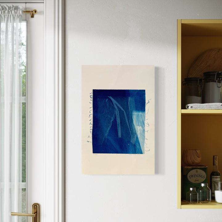 The artwork, Cyanotype Veil 2, by Starr Tucker-Ortega, displayed in a room.