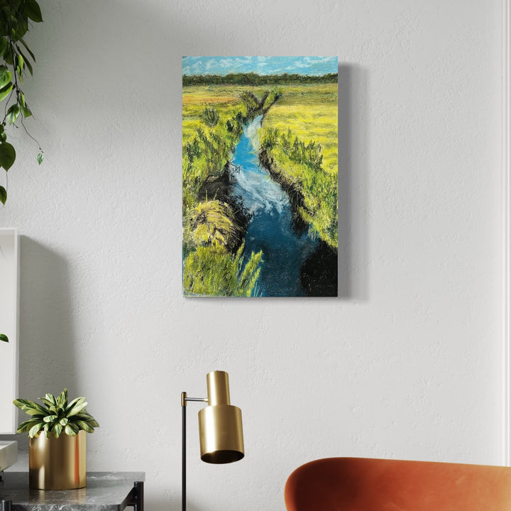 The artwork, Dartmouth Saltmarsh, by Robert Dec, displayed in a room.
