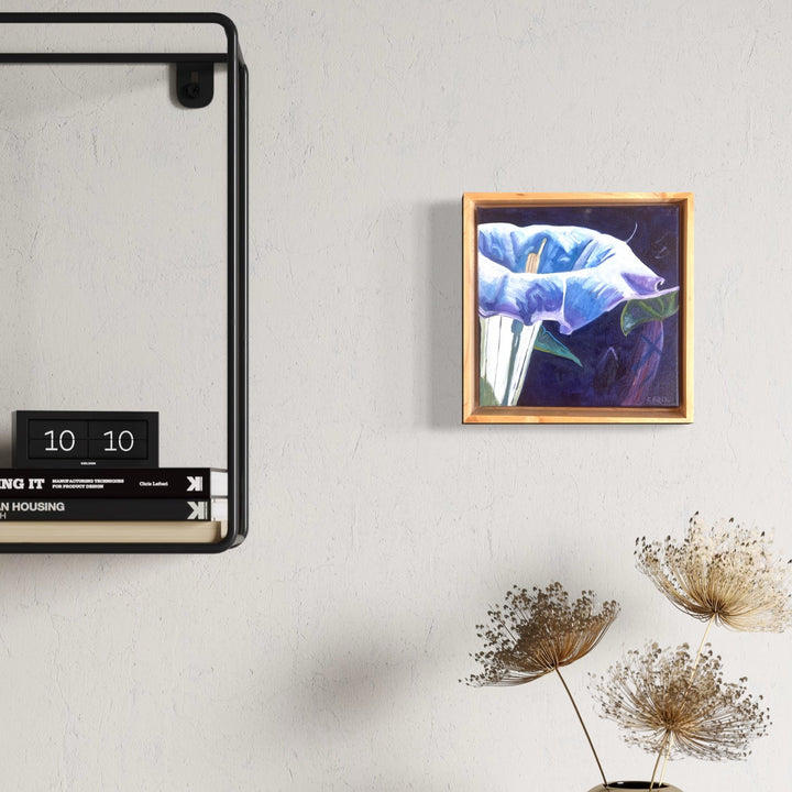 The artwork, Datura, by Connie Falk, displayed in a room.