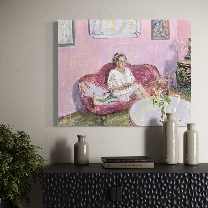 The artwork, Debra and I Listen to Books, by Catherine Webb, displayed in a room.