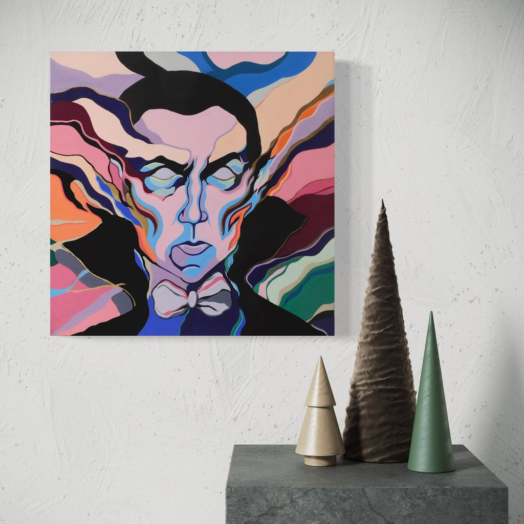 The artwork 'Dracula' by Ellannah Sadkin features a stylized portrait against a swirling background of pink, blue, and orange hues. The abstract interpretation shows sharp geometric shapes forming a figure in black with a bow tie, surrounded by fluid, wave-like patterns. Created in acrylic on 16x16 inch canvas, the piece combines pop art and modern artistic elements.