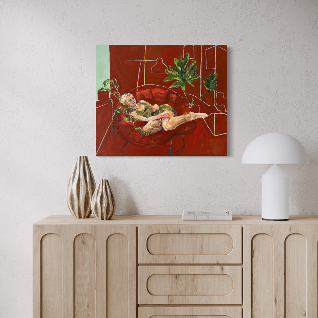 The artwork, Elaina and Plants, Resting, by Catherine Webb, displayed in a room.