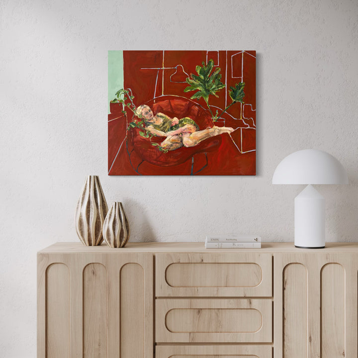 The artwork, Elaina and Plants, Resting, by Catherine Webb, displayed in a room.