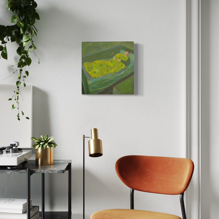 The artwork, Emma napping in their studio, by Chelsie Sunde, displayed in a room.