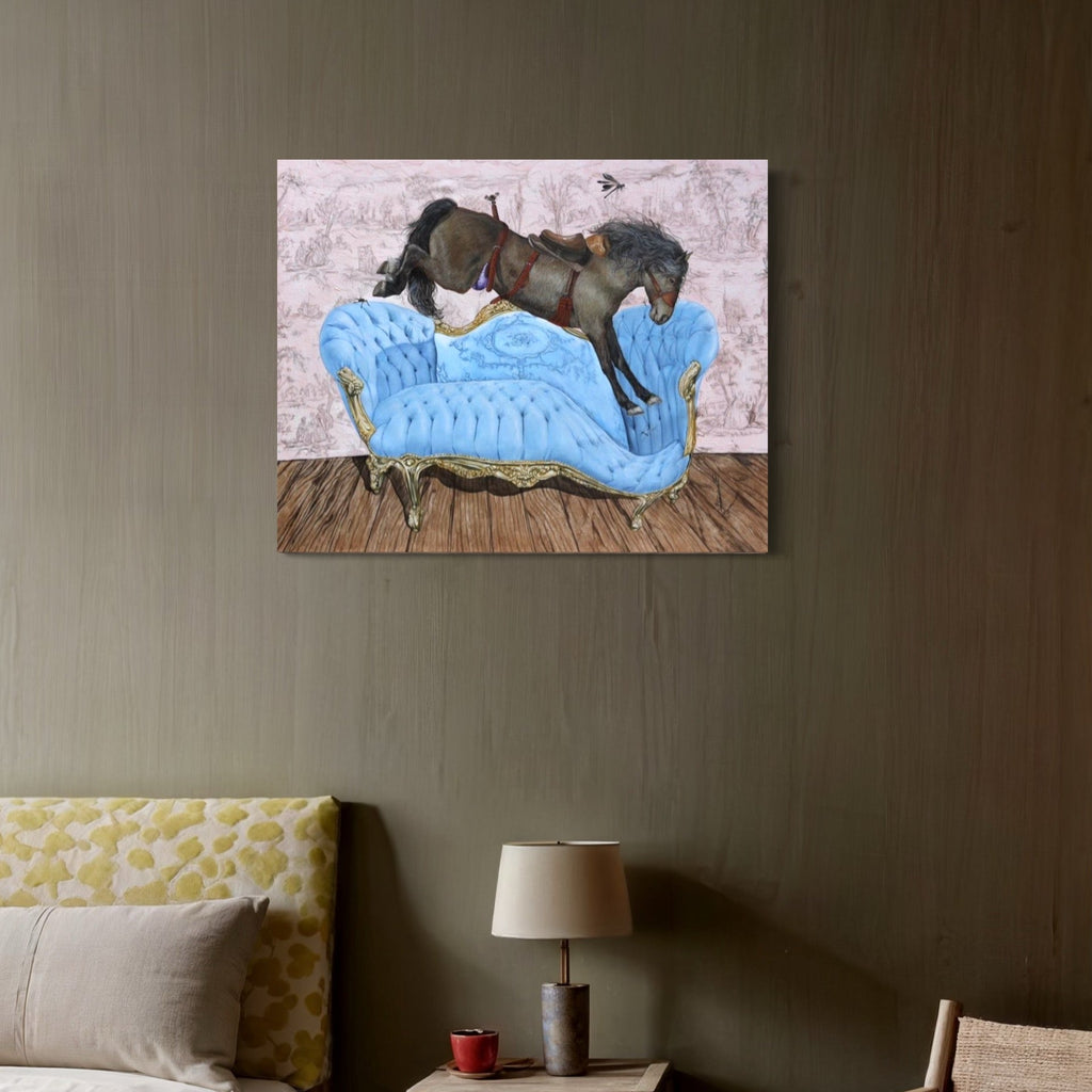 The artwork 'Equestrian Style and Decor III' depicts a dark horse reclining on a tufted light blue Victorian chaise lounge against a textured taupe background. The acrylic painting shows rich contrast between the elegant furniture and the whimsical pose of the horse on wooden flooring. By Carlos Gamez de Francisco.