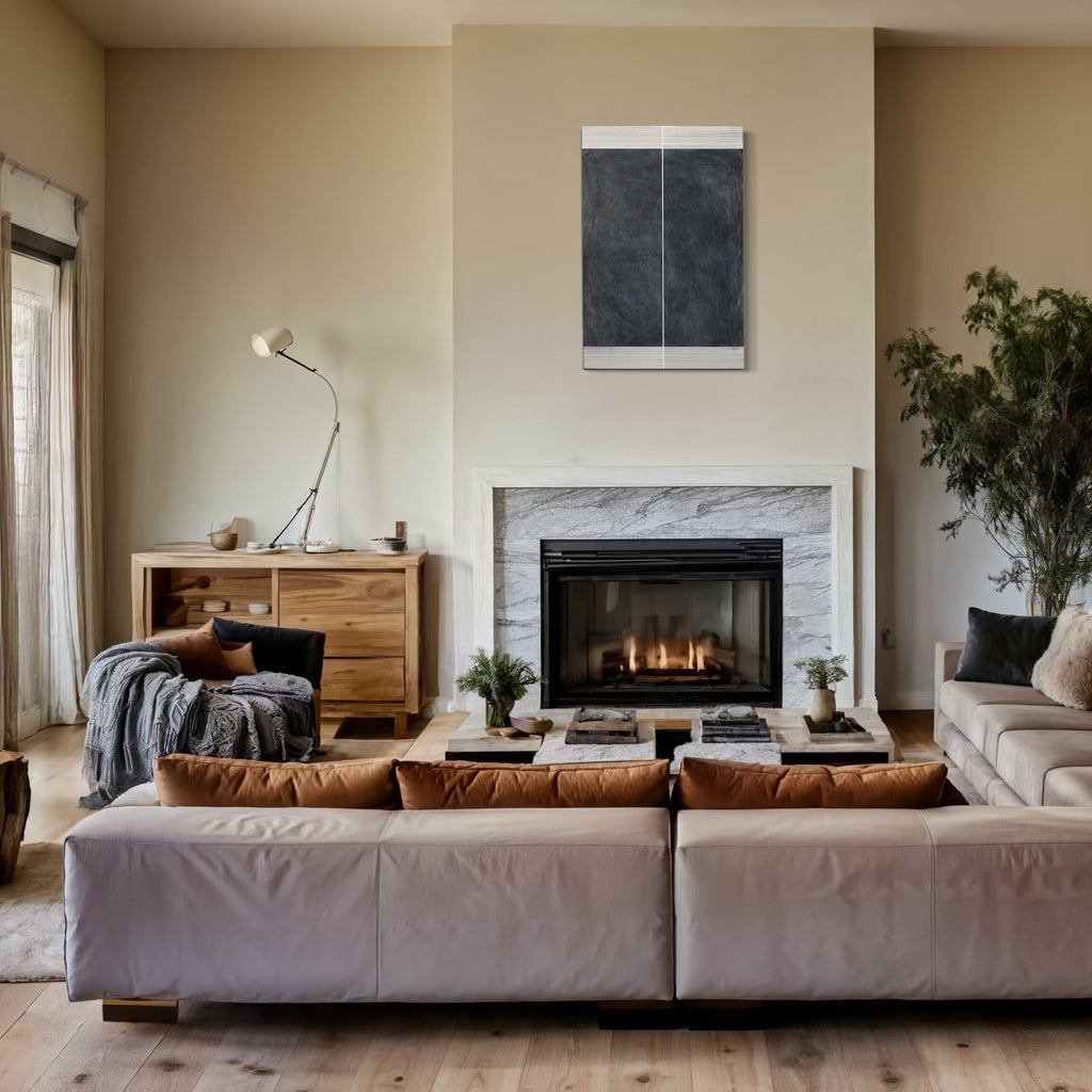 Erasure 34 by Erika Mahr: Abstract minimalist charcoal artwork featuring vertical lines and dark tones mounted above marble fireplace in modern living room