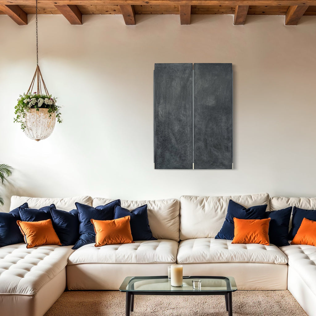 Erasure 47 by Erika Mahr: Abstract grey diptych with vertical line detail in charcoal and paint, mounted above modern sectional