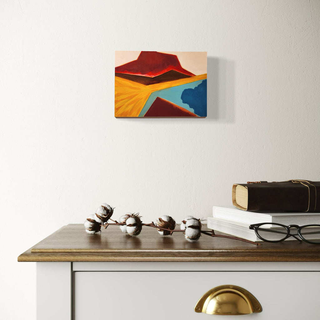 The artwork, Erupt, by Joanie Flickinger, displayed in a room.