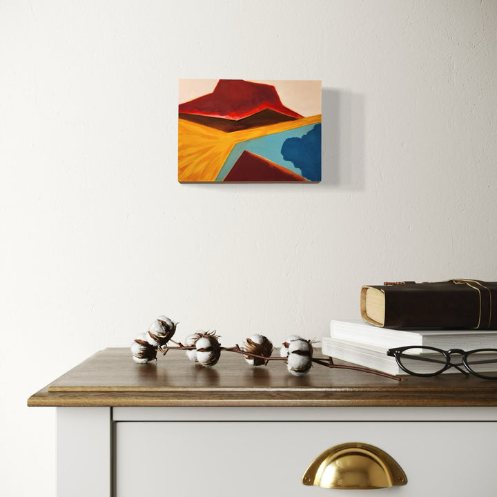 The artwork, Erupt, by Joanie Flickinger, displayed in a room.