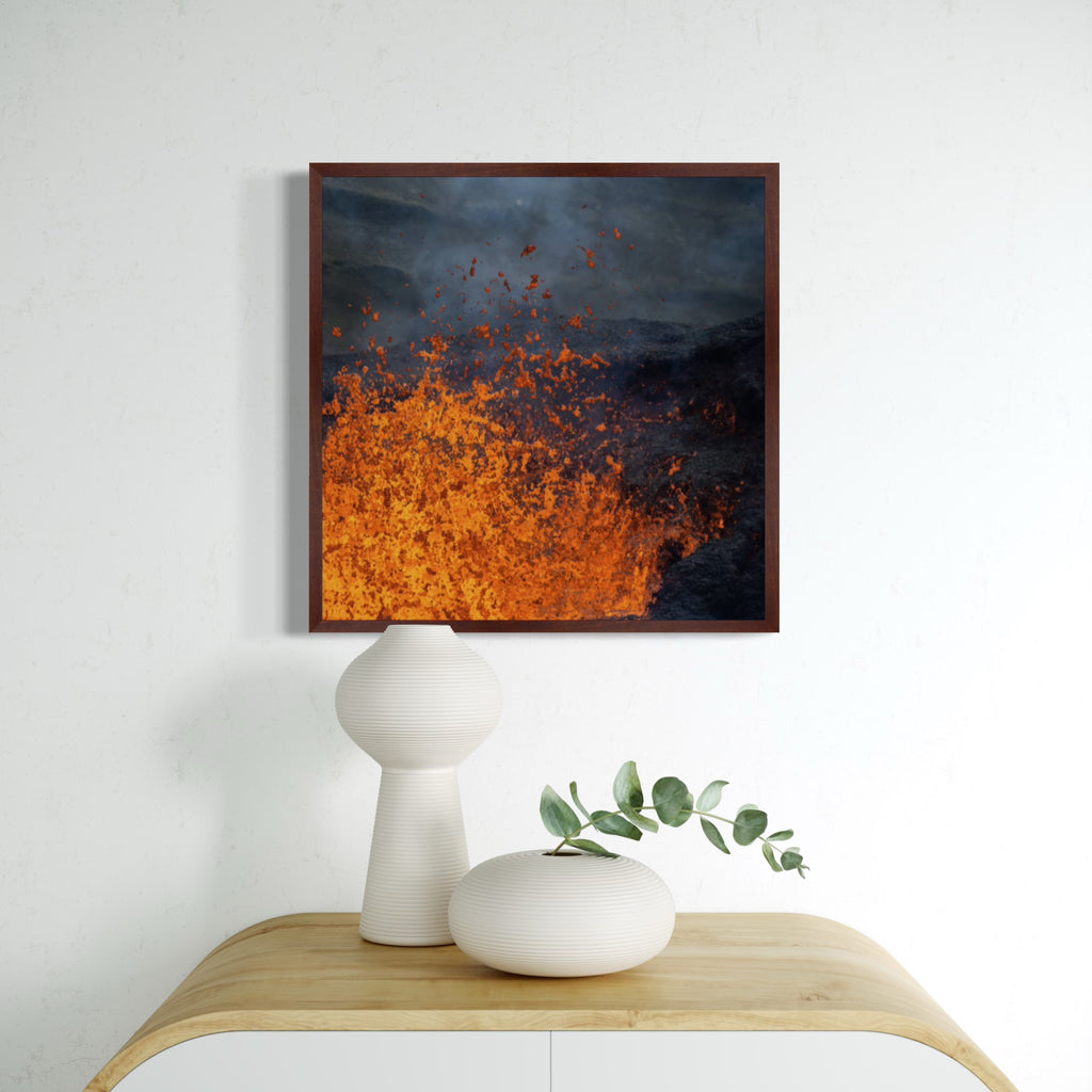 Eruption by Kyle Murphy features a vivid portrayal of molten lava bursting from a dark volcanic landscape, with bright orange and red flames contrasting against smoky, shadowy surroundings, capturing the raw intensity and dynamic power of an active eruption.