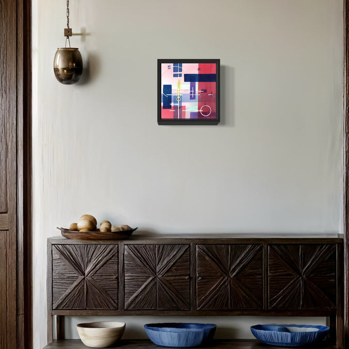 The artwork 'Expanding Knowledge' by Arthur Norcome features a geometric abstract watercolor composition in navy blue, pink, and white squares arranged in a modernist grid pattern. The 8x8 inch piece displays clean lines and blocks of color, creating a balanced contemporary design with subtle color transitions and architectural precision. By Arthur Norcome.
