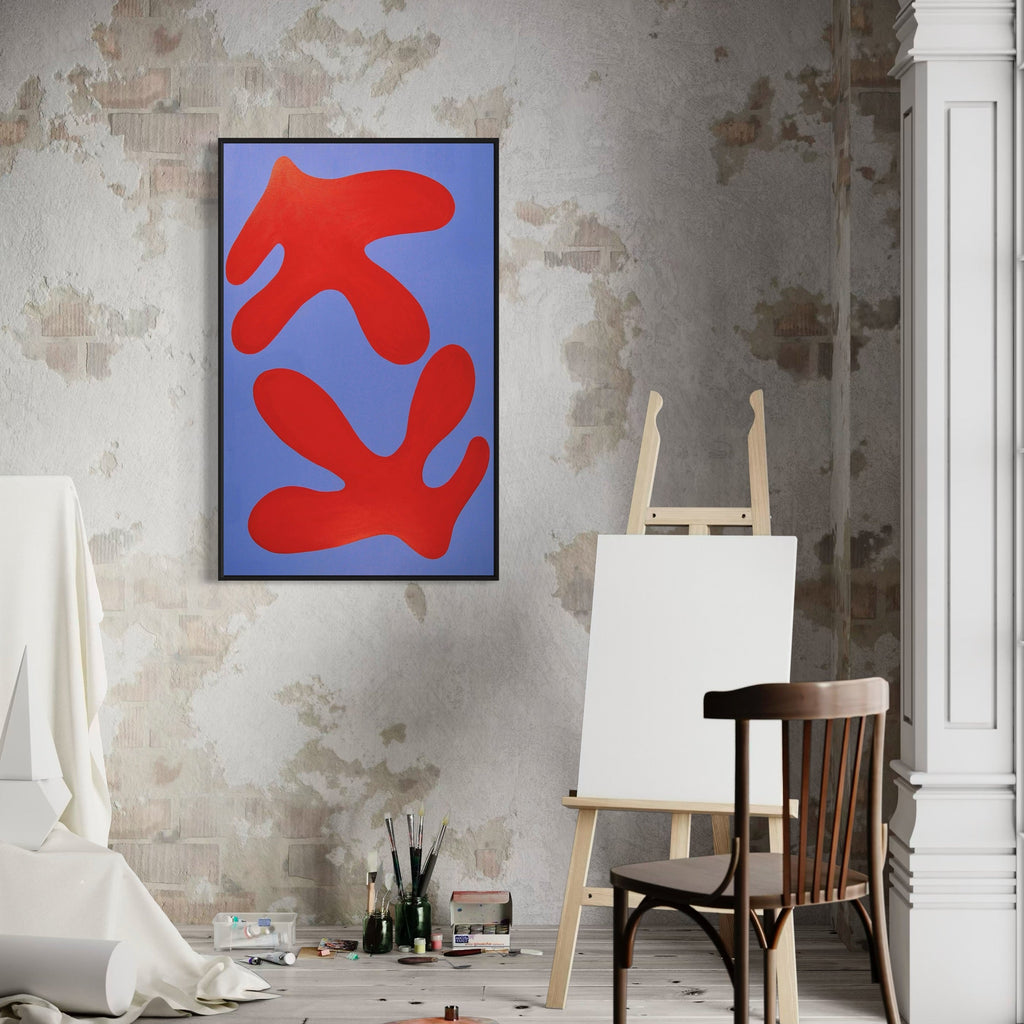The artwork 'FERN I' by Shadia Sabagh features bold abstract shapes in vibrant red against a serene blue background. Two organic, leaf-like forms create a dynamic composition reminiscent of Matisse's cut-out style. The acrylic on canvas painting showcases fluid, biomorphic shapes that dance across the 48x30 inch surface, creating a striking modern minimalist aesthetic. By Shadia Sabagh.