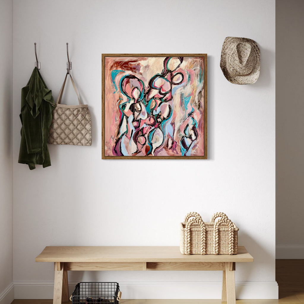 The artwork, Figures in Pink & Blue #2, by Kaitlin Andrews, displayed in a room.