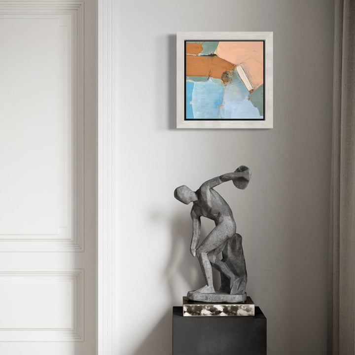 The artwork, Floating Geometry, by Leslie Thornton, displayed in a room.