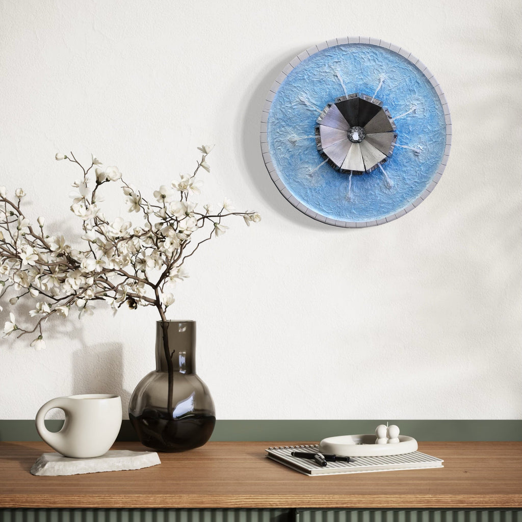 The artwork, Fountain Blue, by Richard Alpert, displayed in a room.