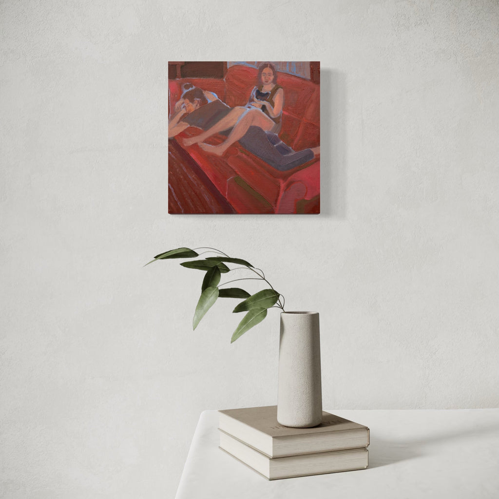 The artwork, God gave us pleasure [roommates and our cat], by Chelsie Sunde, displayed in a room.