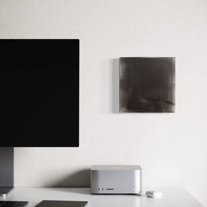 The artwork, Graphite Veil 1, by Debra Ramsay, displayed in a room.