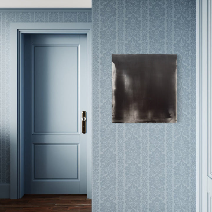 The artwork, Graphite Veil 3, by Debra Ramsay, displayed in a room.