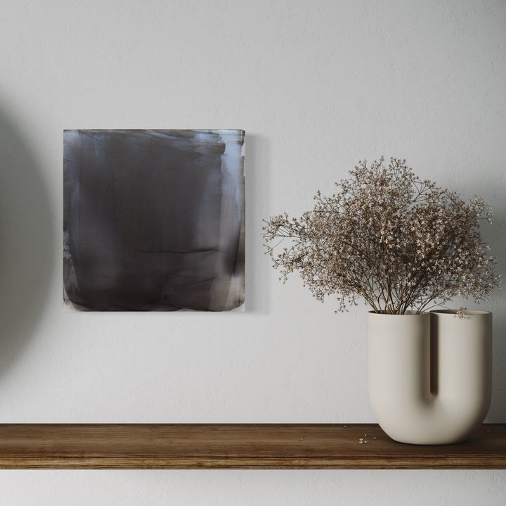 The artwork, Graphite Veil 8, by Debra Ramsay, displayed in a room.