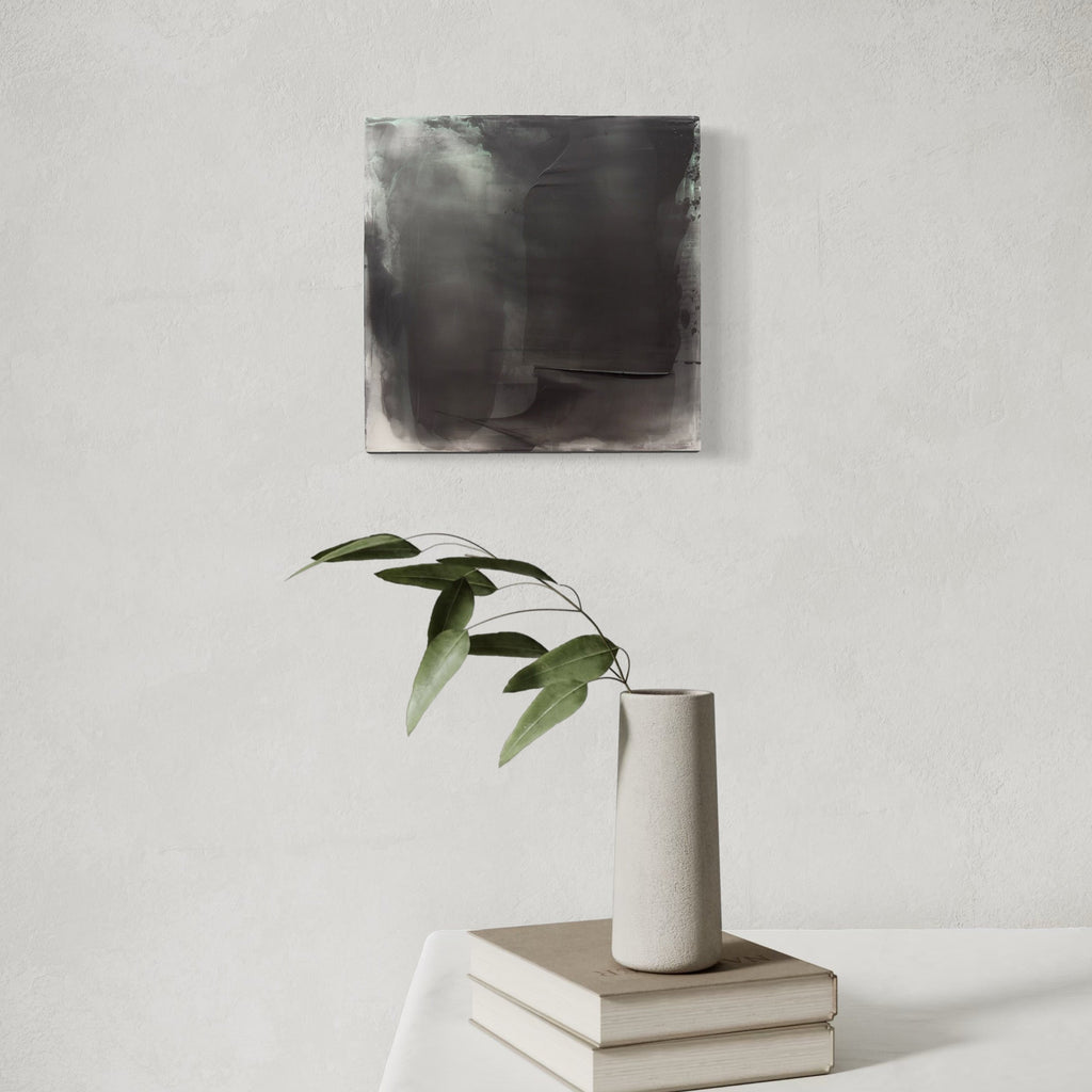 The artwork, Graphite Veil 9, by Debra Ramsay, displayed in a room.