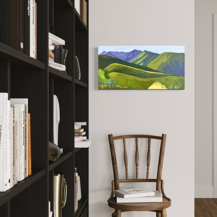 The artwork, Green Hills, by Connie Falk, displayed in a room.