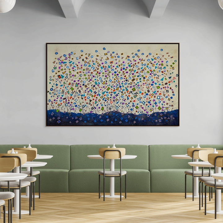 The artwork, Humanity is Diversity, by Dorothea Sandra, displayed in a room.