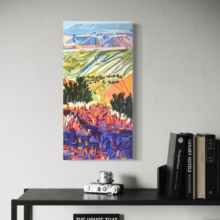 The artwork, Jemez in the Distance, by Connie Falk, displayed in a room.