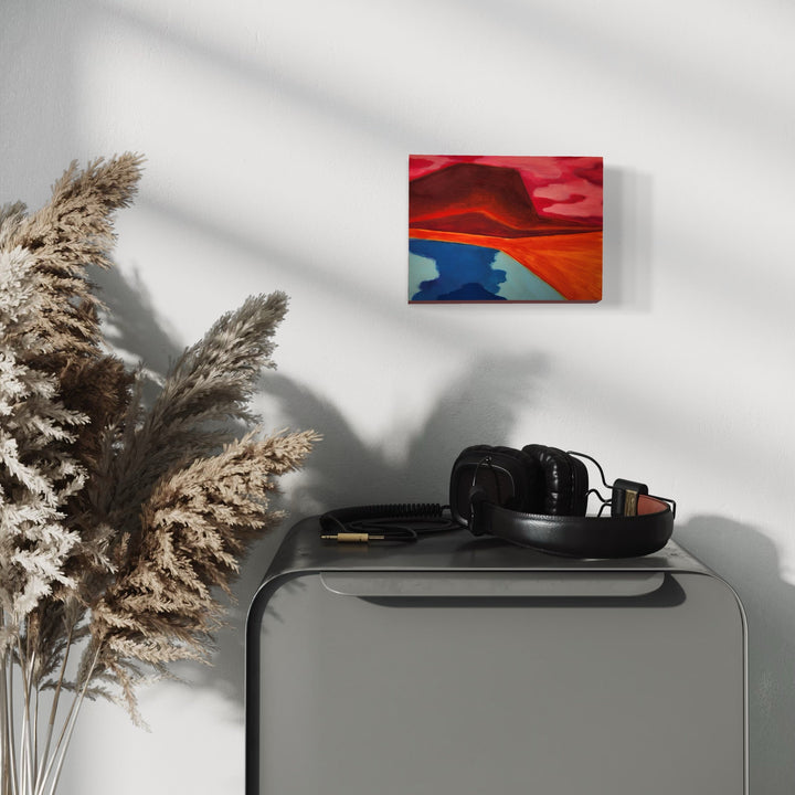 The artwork, Land Ho, by Joanie Flickinger, displayed in a room.
