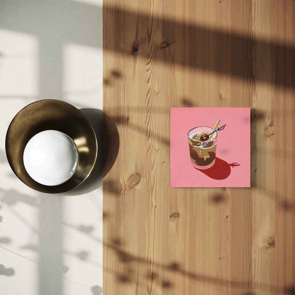 The artwork 'Light Pink Drink' by Lori Larusso depicts a stylized beverage in a clear glass against a pink background. The drink appears to be an iced beverage with a straw and garnish, rendered in acrylic on a 10x10 inch wood panel. The illustration features clean lines and a minimalist pop art style, cast with natural shadows on a wooden surface.
