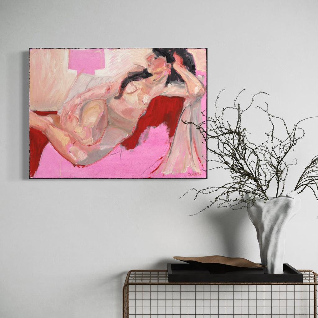 Lisa's Chaise by Cristi Lyon: Abstract oil painting depicting a reclining figure in soft peachy tones against a vibrant pink background. Bold red accents and fluid brushstrokes create a contemporary impressionistic style on oil paper, measuring 22 inches high by 30 inches wide. - By Cristi Lyon