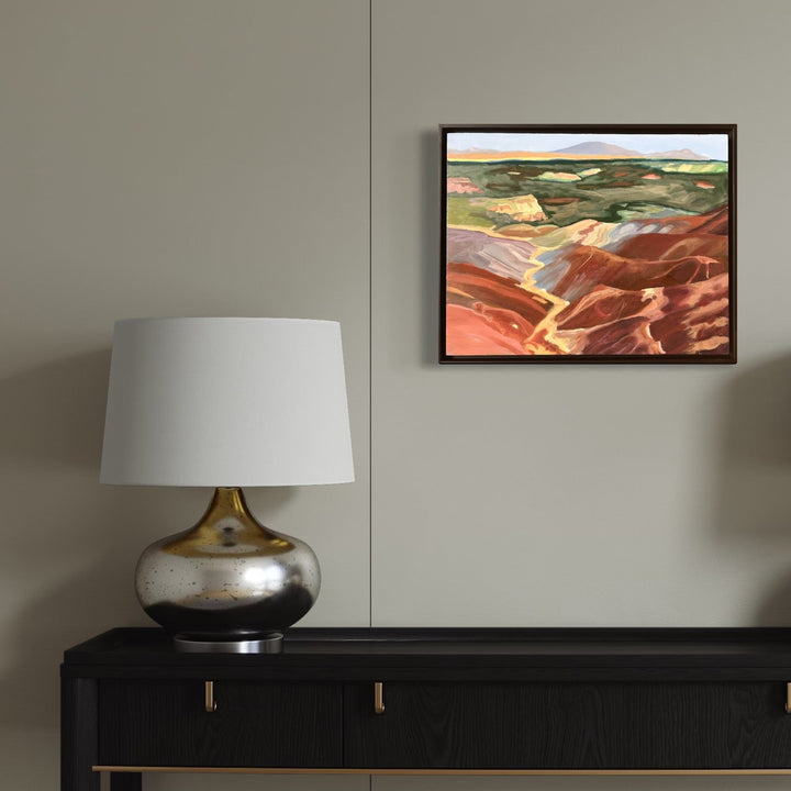 The artwork, Long Valley, by Connie Falk, displayed in a room.