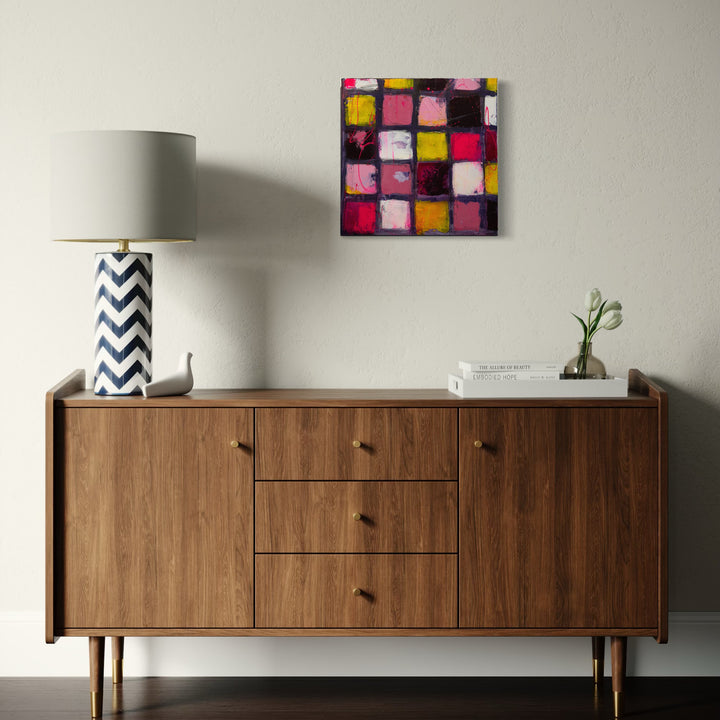 The artwork, Love is Bright Pink, by Deborah Chaney, displayed in a room.