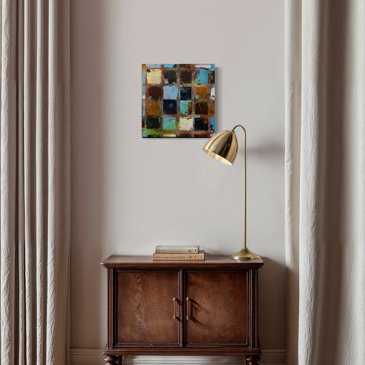 The artwork, Loving Our Earth IV, by Deborah Chaney, displayed in a room.