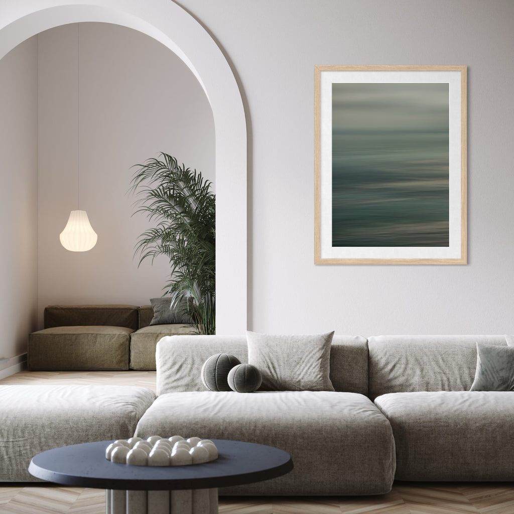 The artwork Malaga Cove Sunrise by Neil Shapiro features a serene abstract landscape with horizontal bands of muted greens, blues, and soft grays blending seamlessly. The smooth texture and subtle gradations evoke a tranquil coastal atmosphere, reminiscent of the meditative minimalism found in Mark Rothko’s color fields and Hiroshi Sugimoto’s calm seascapes.