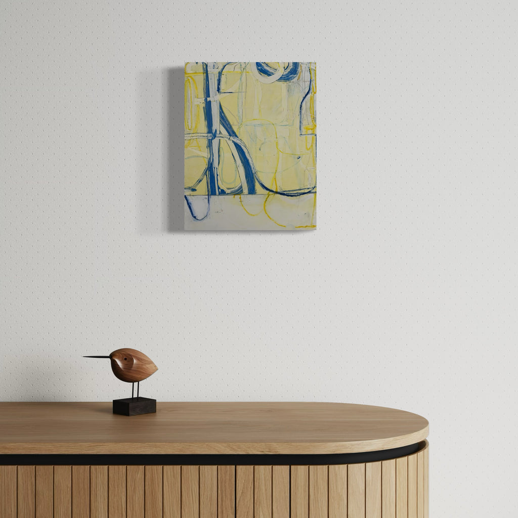 Mohonk Series no. 7 by Janice La Motta features bold abstract brushstrokes in cobalt blue and vibrant yellow against a pale cream background. Dynamic curved lines and geometric shapes create a sense of movement across the Yupo surface, with expressive oil stick marks revealing gestural energy and compositional rhythm. By Janice La Motta