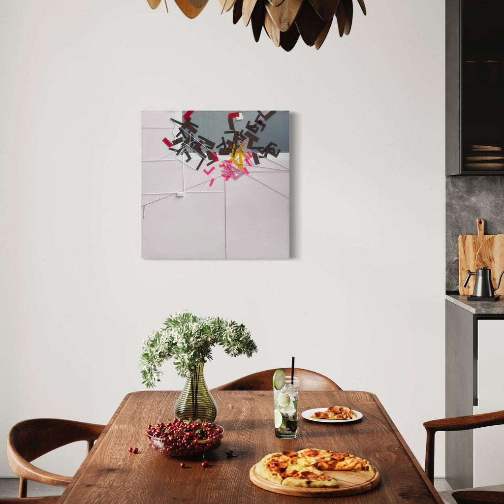 The artwork 'Monter Foggnussi' by Philippe Halaburda features abstract geometric shapes in black, pink, and red tones arranged dynamically against a light gray background. The composition suggests a burst of angular forms emerging from linear divisions, displayed as a 30x30 inch mixed media piece on canvas, creating a modern, urban-inspired aesthetic.