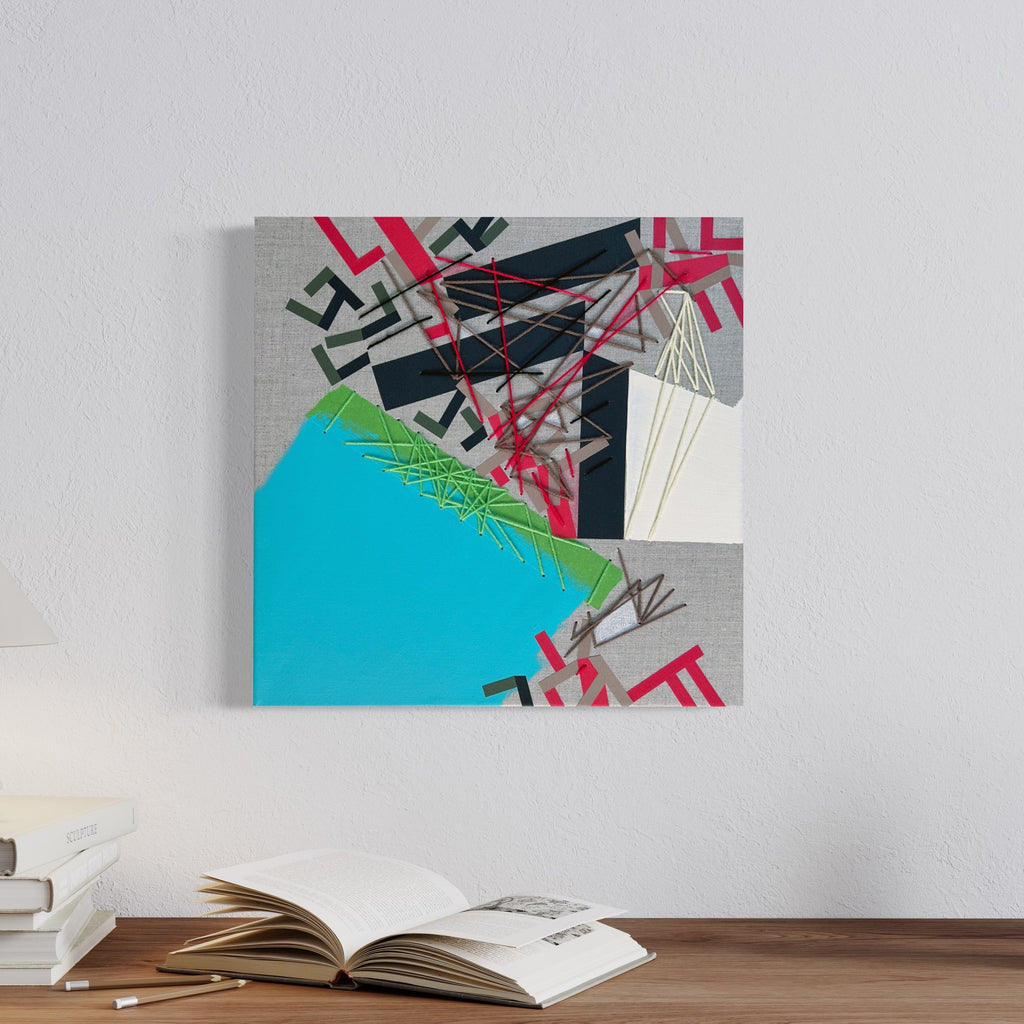 The artwork 'Nakkar Menndriis' by Philippe Halaburda features bold geometric abstract composition with vibrant turquoise, neon pink, and green elements. Angular shapes intersect with linear patterns created using yarn and tape, set against a gray canvas background. Mixed media artwork combining acrylic paint with textural elements in a contemporary urban style.