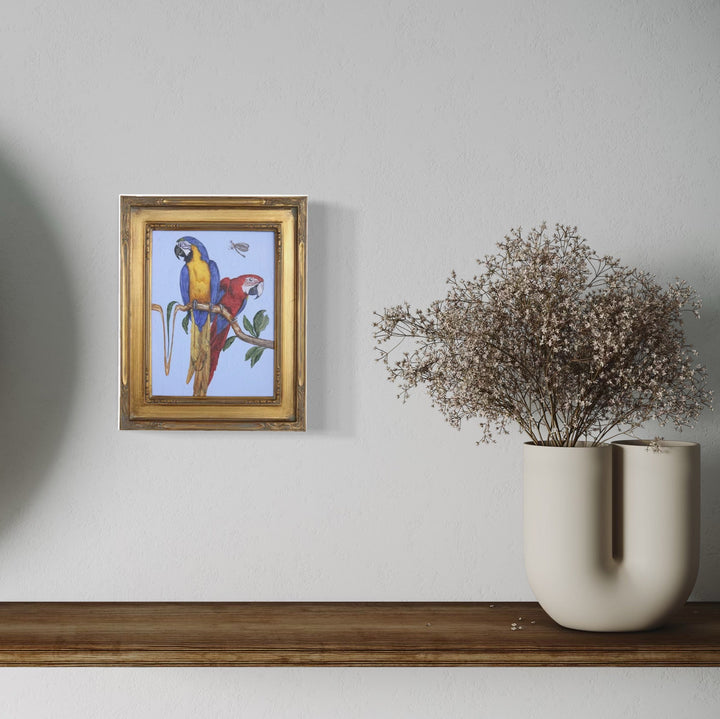 The artwork, New World Parrots, by Carlos Gamez de Francisco, displayed in a room.