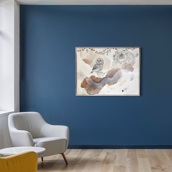 The artwork, Northern Saw-Whet Owl, Cute With an Attitude, by Alicia Hauff, displayed in a room.