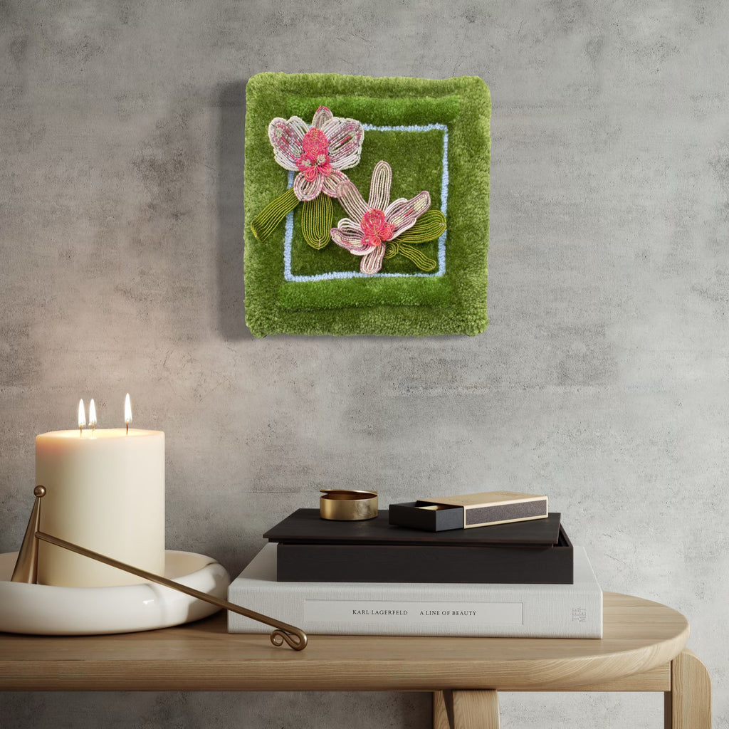 The artwork, Orchids, by Abigail Henthorne, displayed in a room.