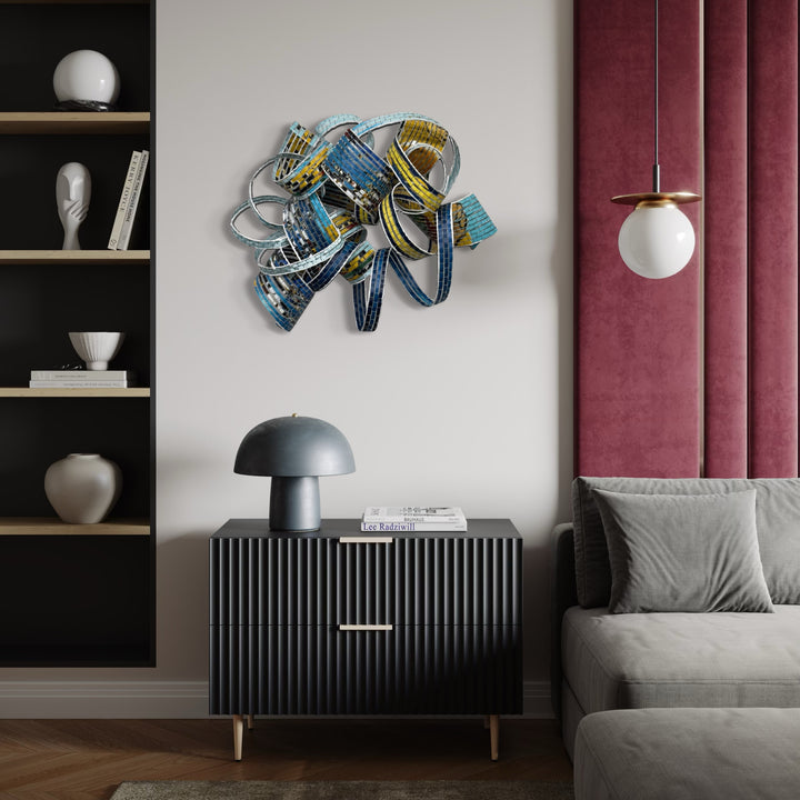 The artwork, Out of this World, by Shelley Heffler, displayed in a room.