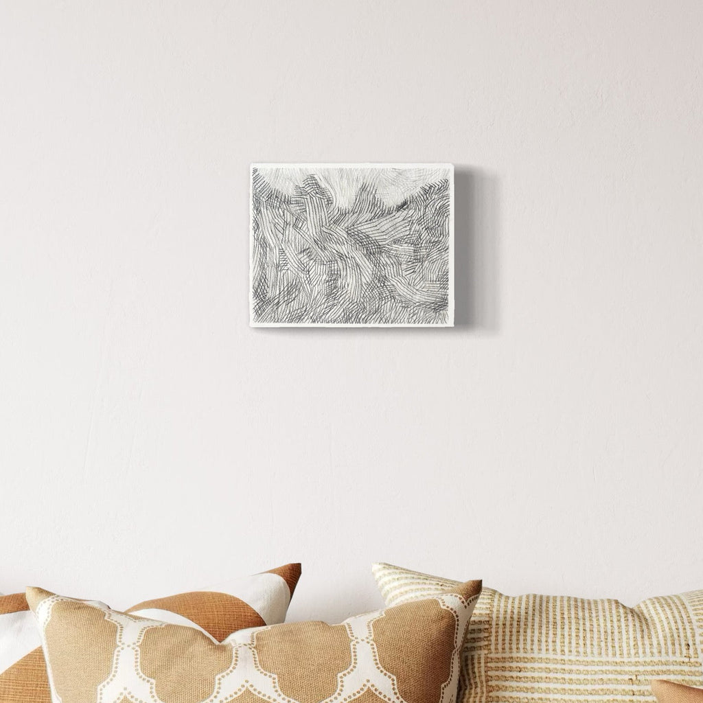 A photo of the artwork Over Under 2, by Zoe Cohen, hanging on a wall.