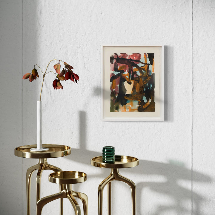The artwork 'Overstory' by Molly Herman features abstract expressionist brushstrokes in warm autumn tones of rust, brown, and navy blue. The acrylic and watercolor piece creates dynamic movement through bold geometric shapes and organic forms, elegantly displayed in a handmade frame against white paper. Custom framed original artwork by Molly Herman.